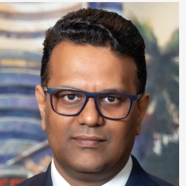 Ravi Dharamshi — investment manager portrait